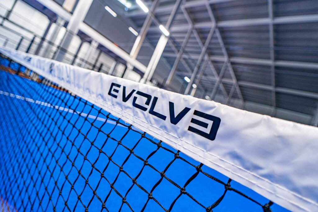 Evolve branded padel net on a court
